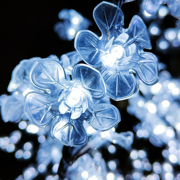 Glowing white cherry blossom LED lights for indoor and outdoor decor.