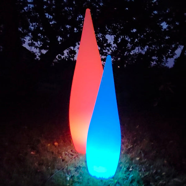 Two colorful LED lights on a dark background
