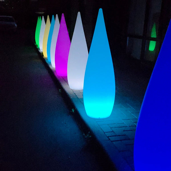 Colorful LED light sculptures on a dark background